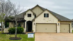 Roof replacement San Antonio inspection showing a professional roofer checking aging shingles, storm damage, flashing, and roof condition on a Texas home.