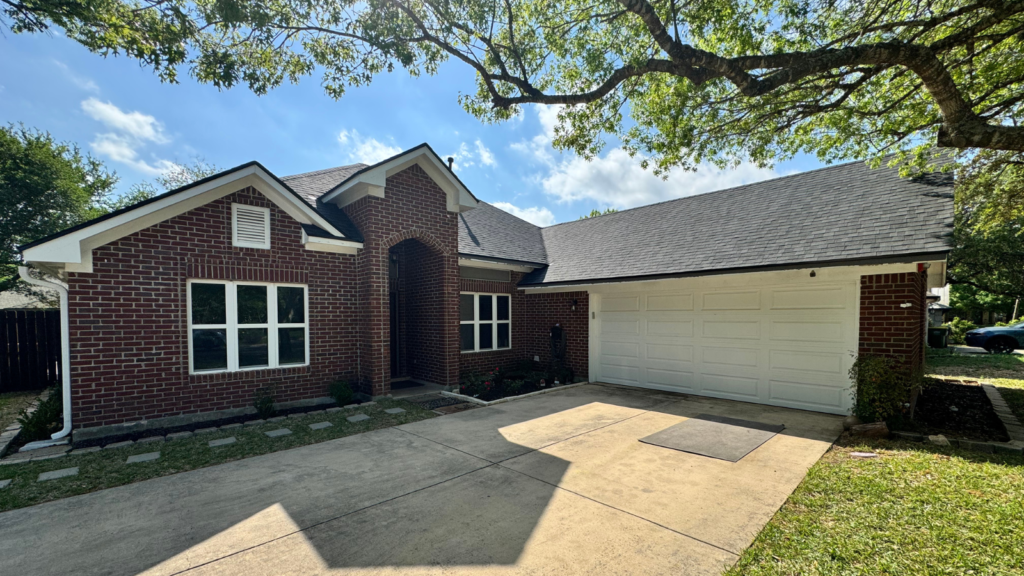 Roof maintenance San Antonio showing trees near a home and potential roof risks