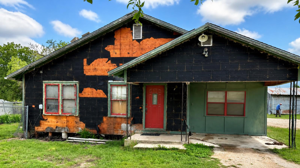 Home exterior damage San Antonio showing roof and siding warning signs